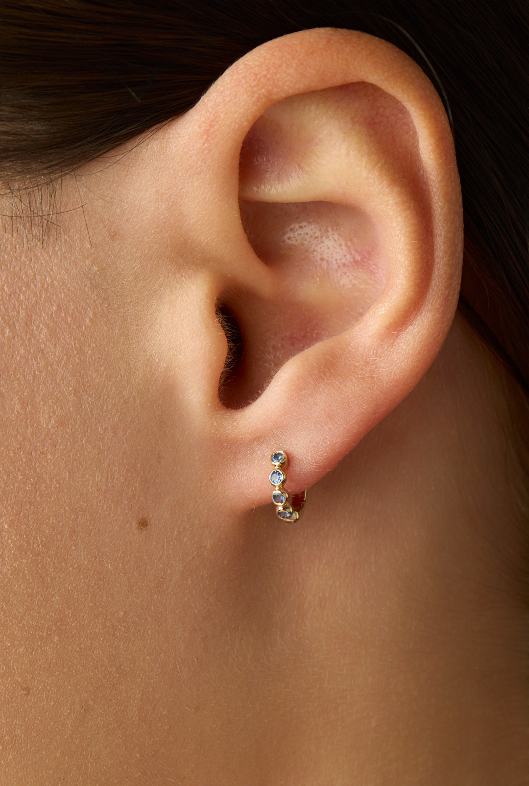 14KY Blue Sapphire Bezel Huggies