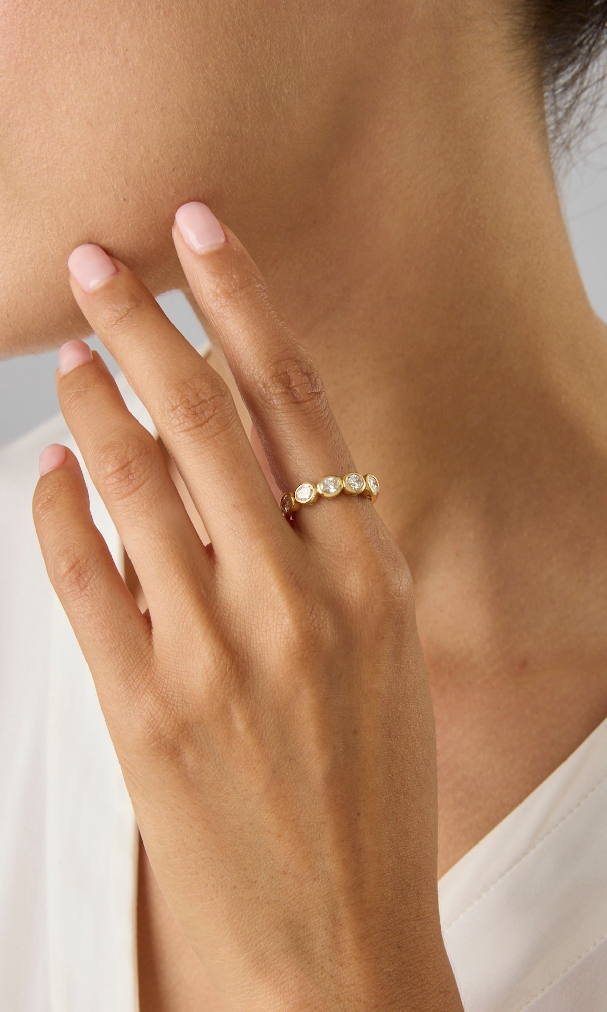 18KY Oval East/West Diamond Bezel Halfway Band