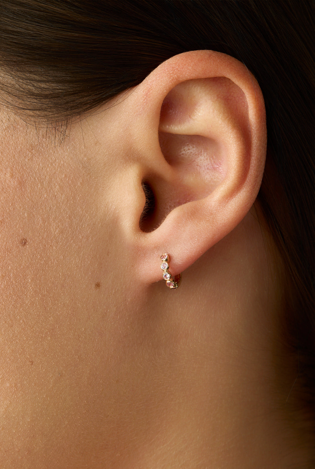 14KY Pink Sapphire Bezel Huggies