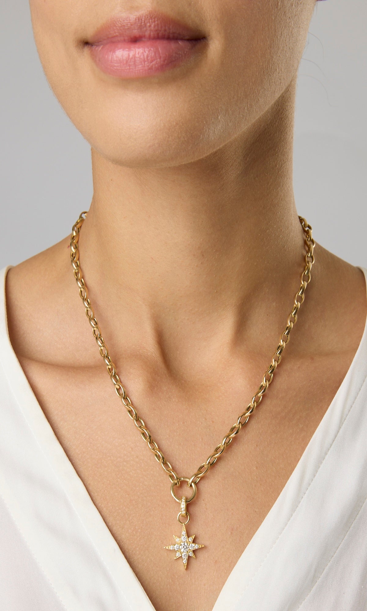 18KY 8 Point Star Charm