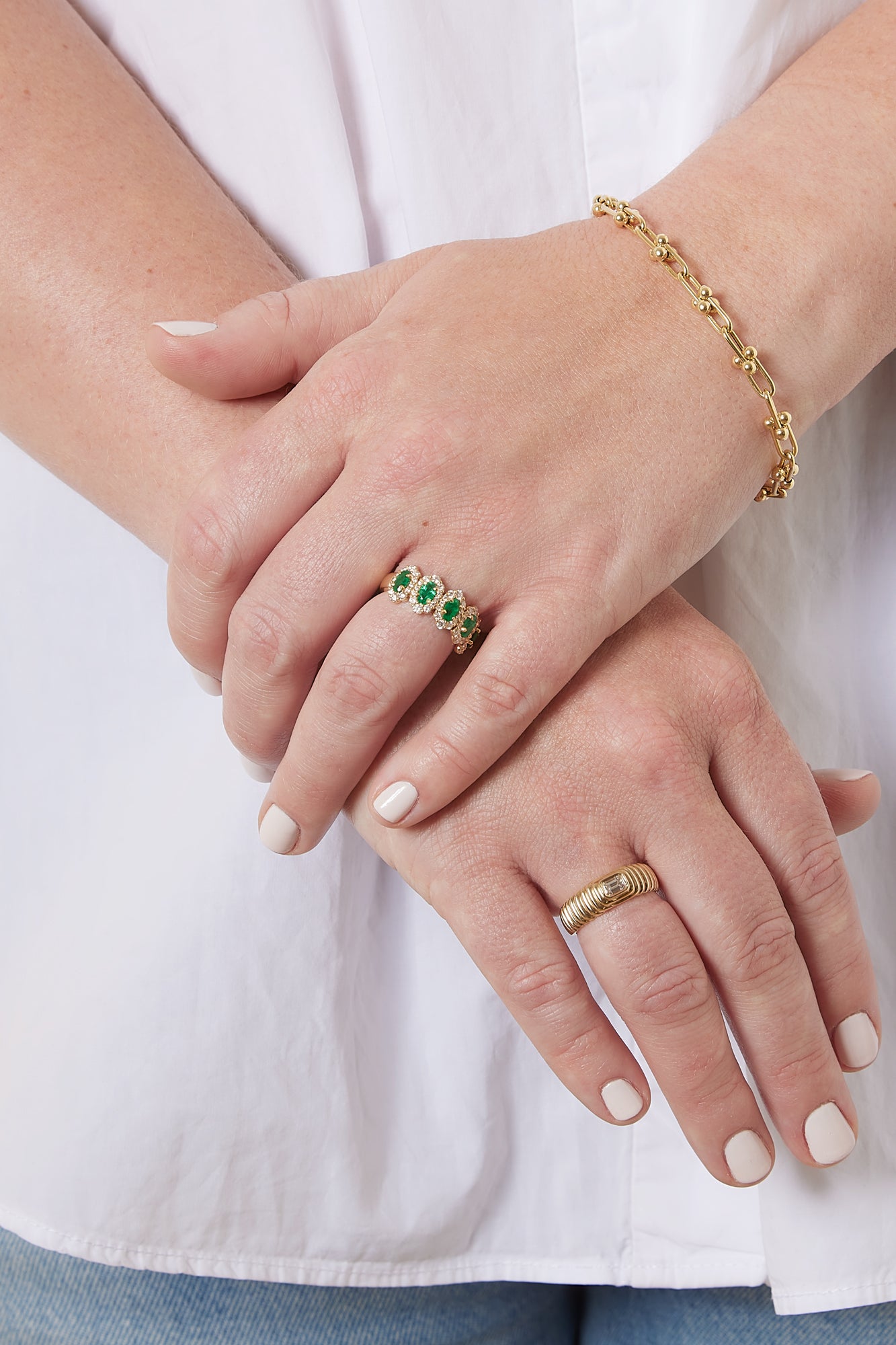 18KY 5 Stone Halo Oval Emerald